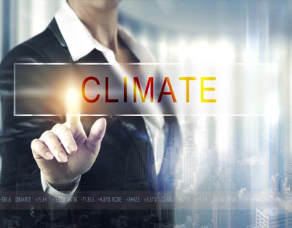 Image of woman pressing a screen with the word Climate