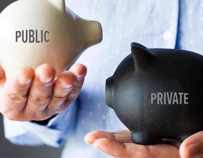 Man Holding Piggy banks with Private on one and Public on the other