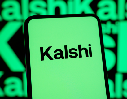 Phone with black text over a green screen reading 